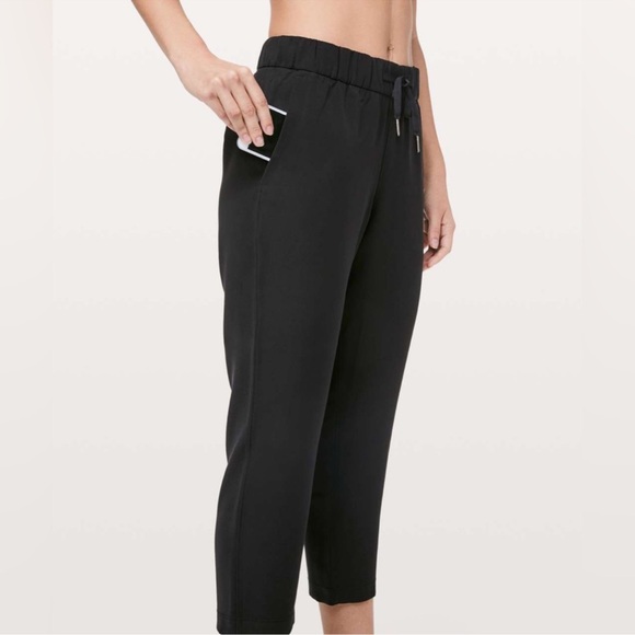 Lululemon On the Fly Woven Crop Drawstring Tapered Pants 24” Black?.